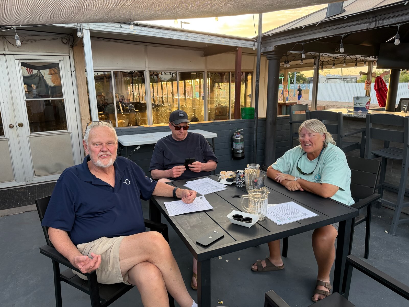 Members inspecting patio construction